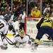 Michigan senior center A.J. Treais tries to score in the game against Michigan State at Joe Louis Arena on Saturday, Feb. 2. Daniel Brenner I AnnArbor.com